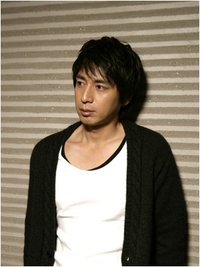 德井义实